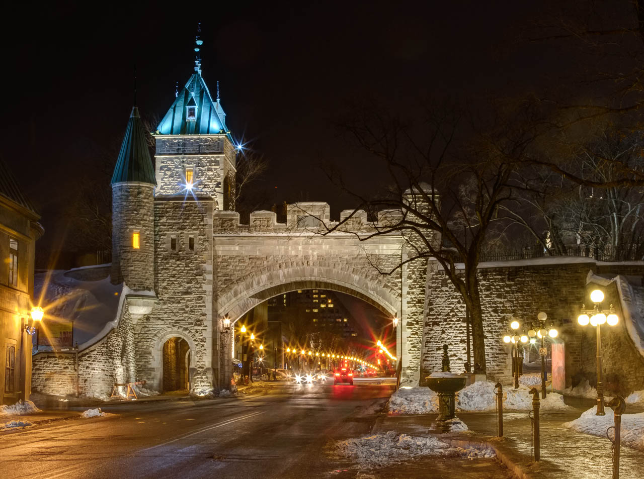 Porte Saint-Louis at night